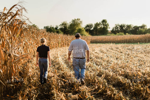 Farmer and Agronomist Walking in Field 8269