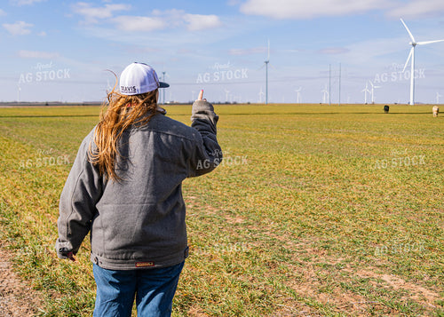 Rancher Pointing in Distance 231099