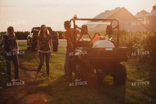 Farmer with UTV Corn Field and Family 4559