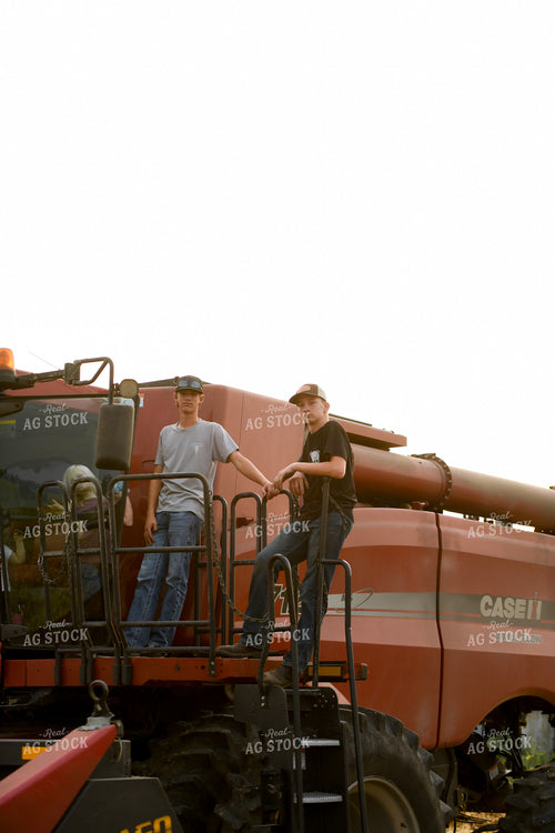 Farm Kids Climbing into Combine 191268