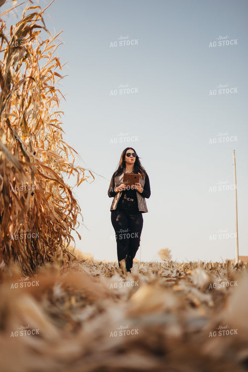 Female Appraiser Valuating Land 9448