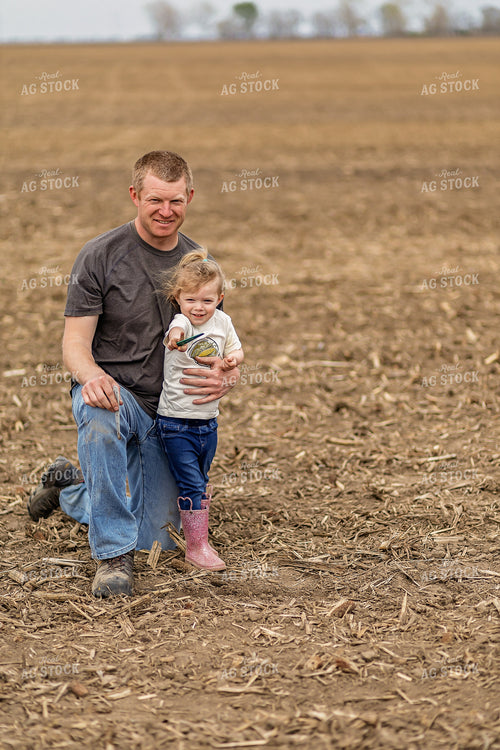 Farmer and Daughter Checking Soybeans 93311