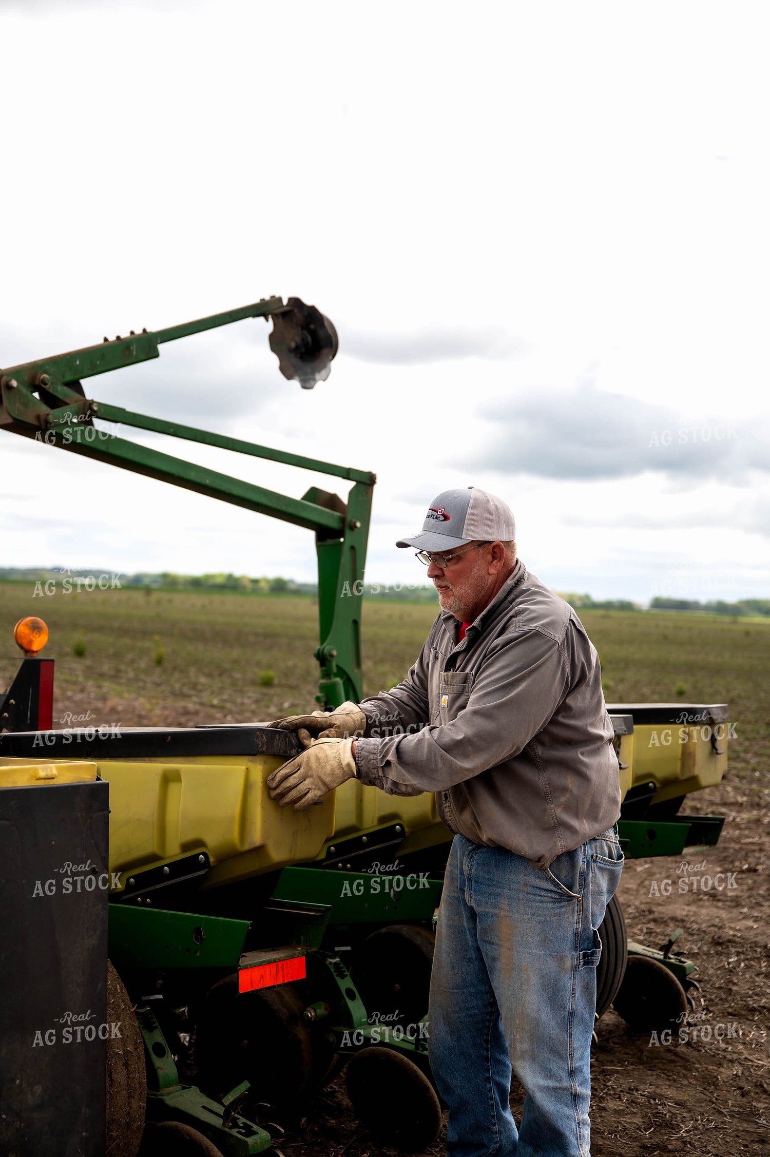Farmer Filling Planter 115769