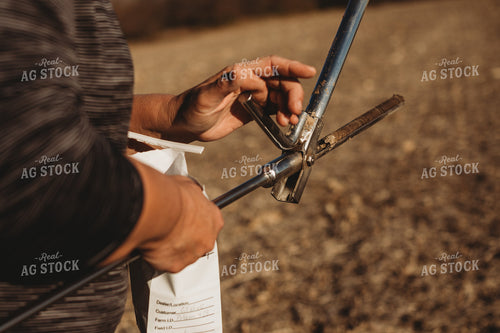 Farmer Opening Soil Sampling Probe with Soil Core 3712