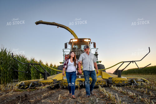 Farmers in Front of Forage Harvester 56552