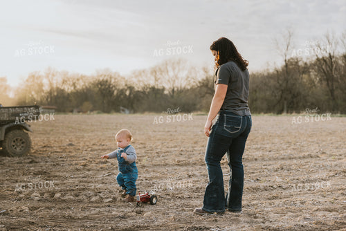 Farmer and Farm Kid in Field 7426