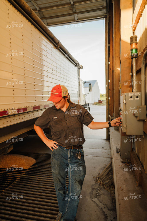 Female Farmer Dumping Semi 115276