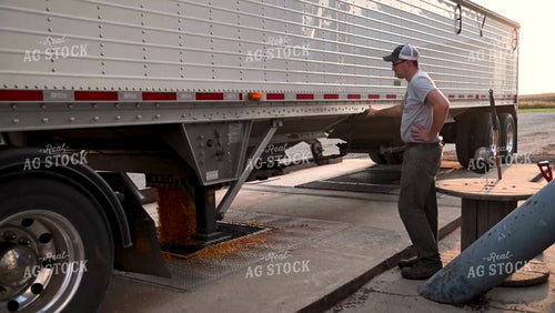 Farmer Unloading Corn from Hopper Bottom Semi to Grain Pit - 409