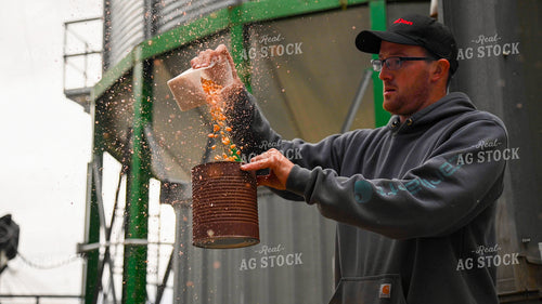 Farmer Testing Corn Moisture On-farm Storage 25622