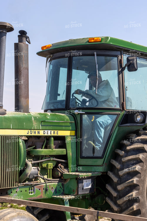 Farmer in Tractor 124003