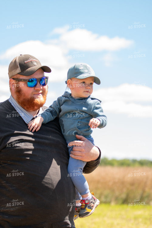 Farmer and Son in Field 157180