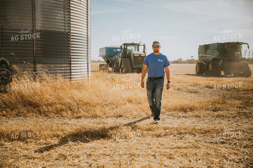 Farmer Walking in Field 7064