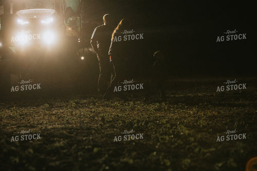 Farm Mom Picking Farm Boy Up from Field at Night 5172