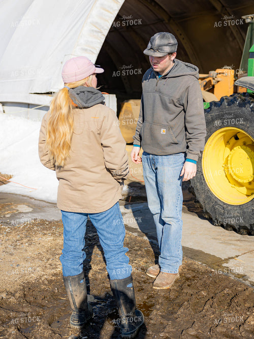 Ranchers Talking in Farmyard 70192