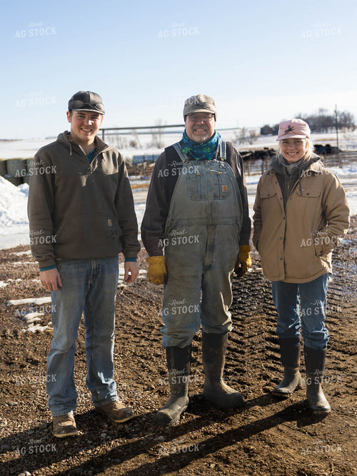Ranchers Smiling on Farm 70238