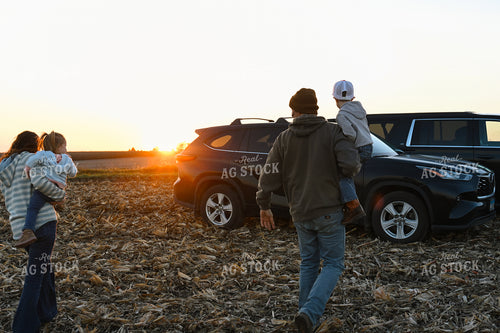 Farm Family Walking in Field 26314