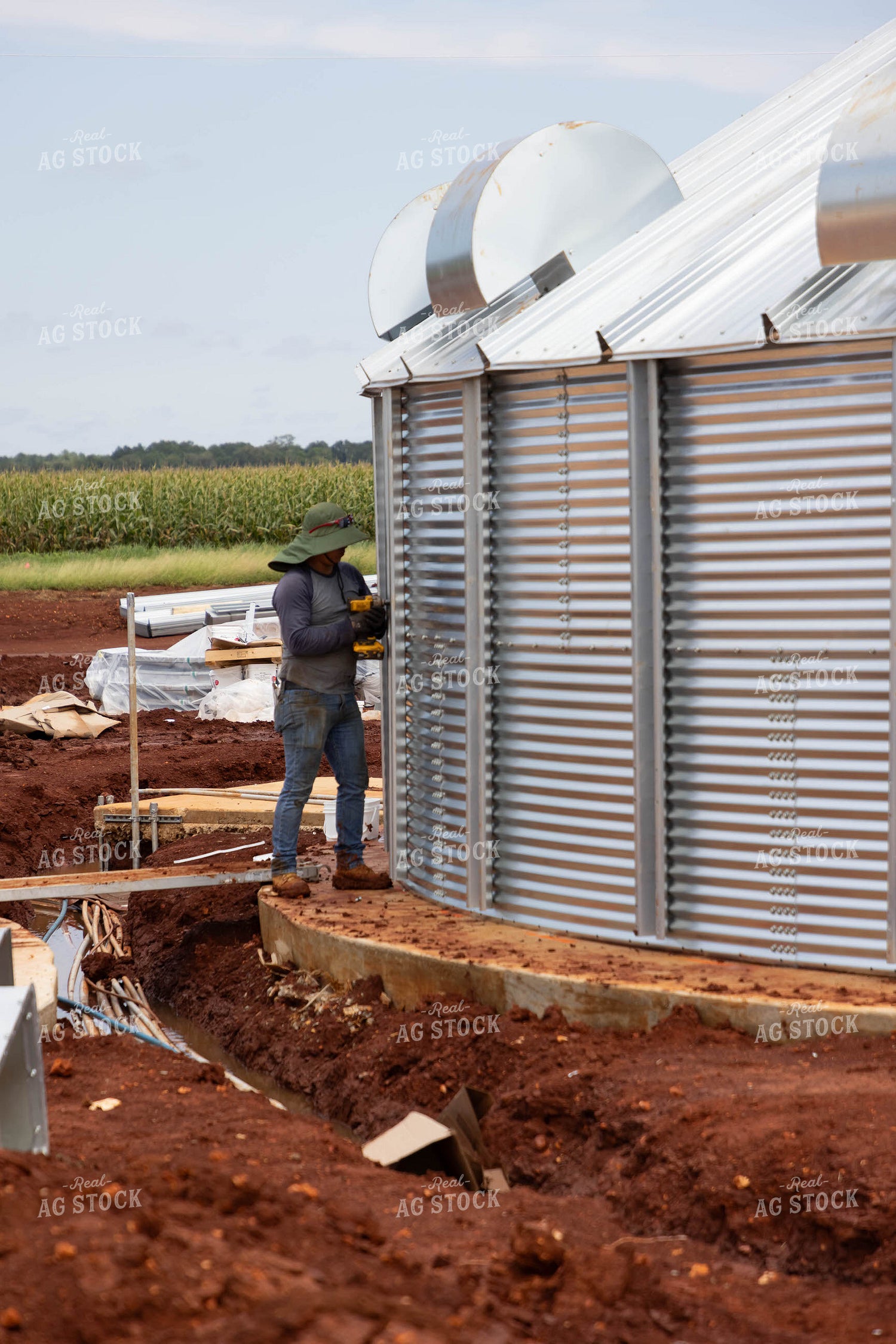 Farmer Putting Up Grain Bin 79364