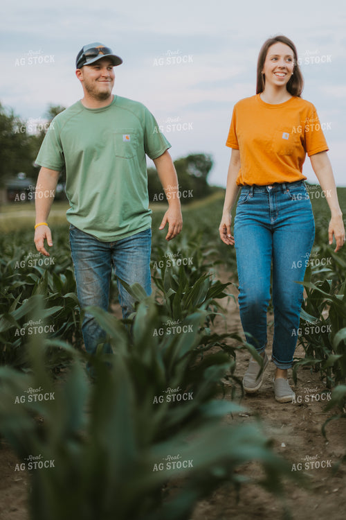 Farmers Scouting Corn Field 7836
