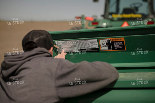 Farmer Checking Drilling Chart 135079