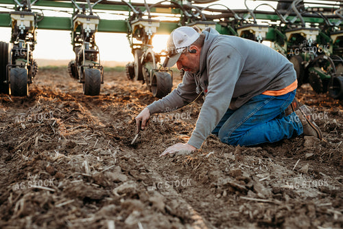 Farmer Checking Seed Depth 133036