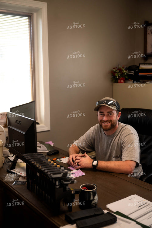 Farmer Working on Computer 115528