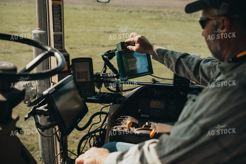 Farmer in Planter with Monitors 4089