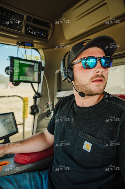 Farmer Driving Tractor 115221