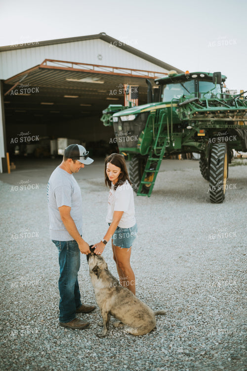 Farmer and Farm Wife Talking Outside Shop 6238