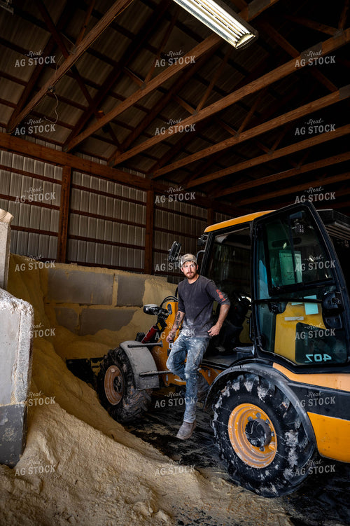 Farmer Getting out of Loader 115535