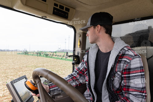 Farmer Operating Sprayer 79559
