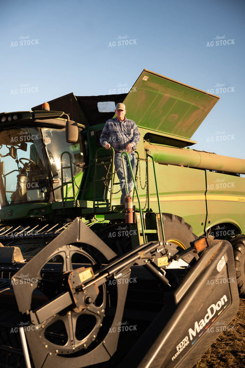 Farmer on Combine 115428