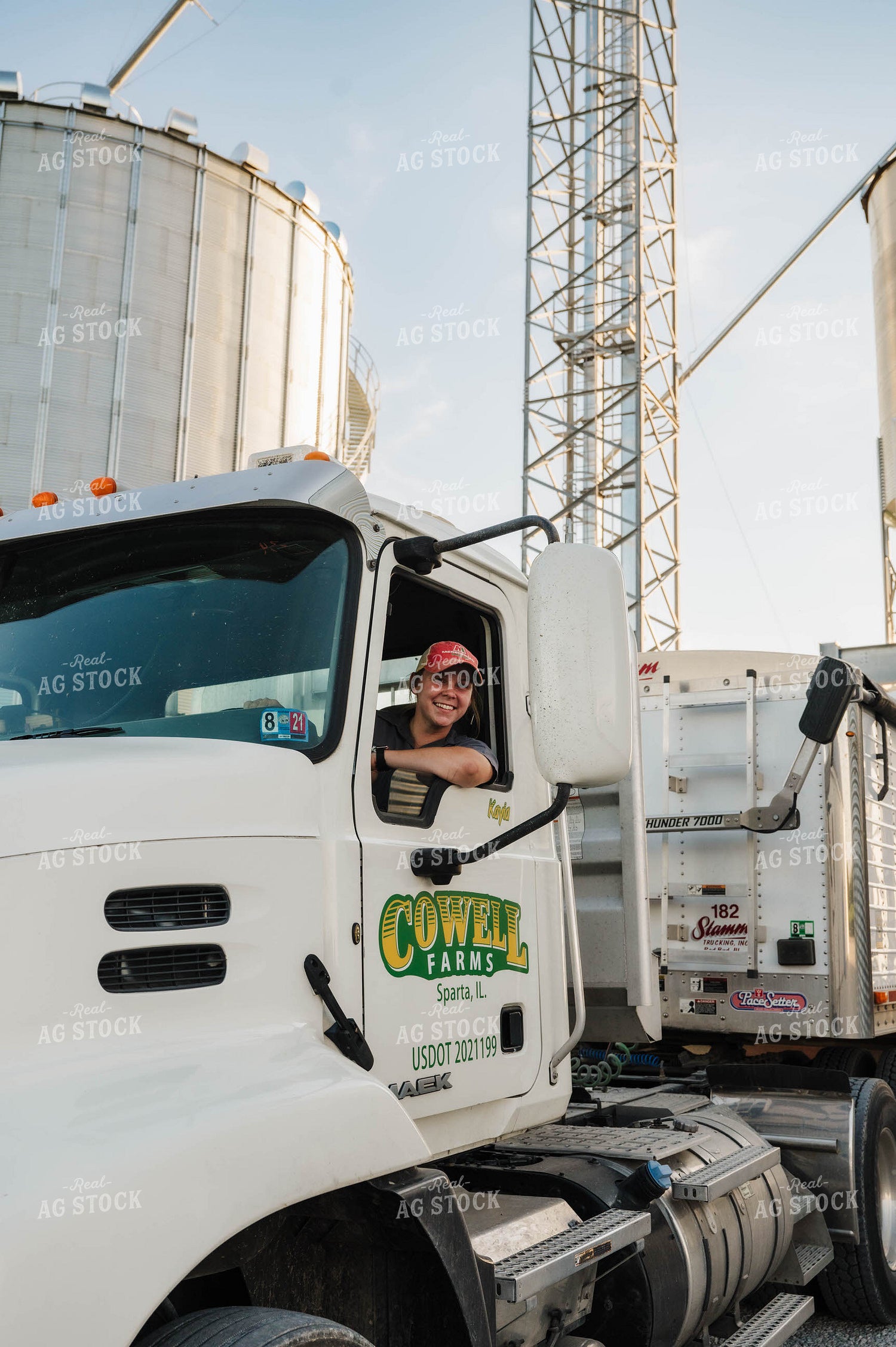 Female Farmer Driving Semi 115294