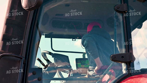 Farmer in the Tractor Cab - 016