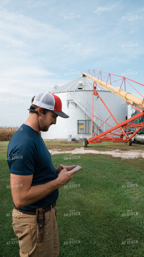 Farmer Using Phone 26256