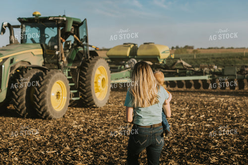 Farm Wife and Child Approach Tractor During Planting 7662