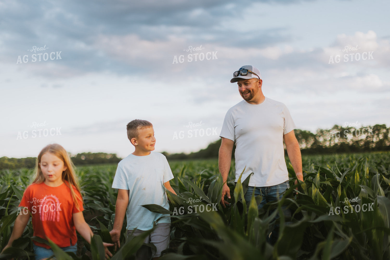 Farmer and Kids Checking Corn 8793