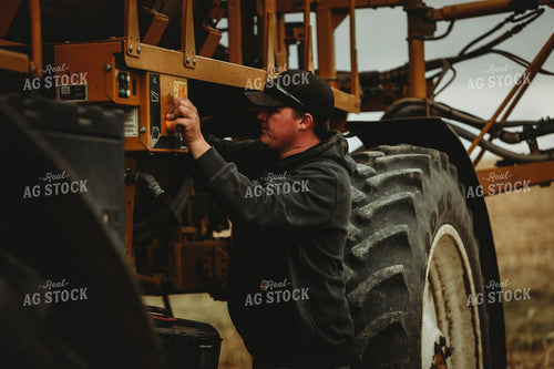 Farmer Setting Up Sprayer 3654
