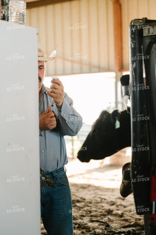 Rancher Drawing Vaccine from Vial 125119
