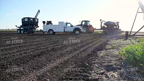 Loading the Planter with the Seed Tender - 092