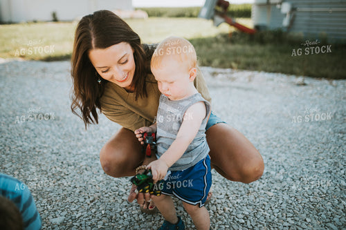Farm Mom and Kids Playing with Toy Tractors 6167