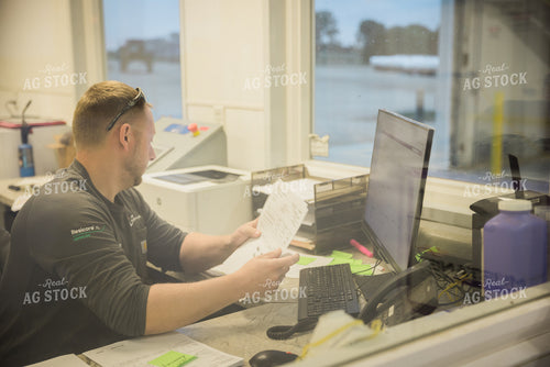 Retailer Working in Office 7887