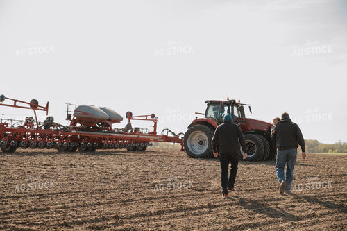 Farm Family in Field During Planting 26052
