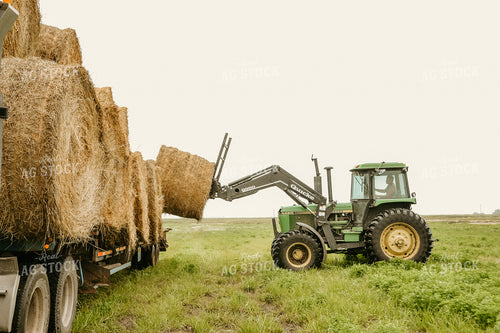 Stacking Round Hay Bales 64096