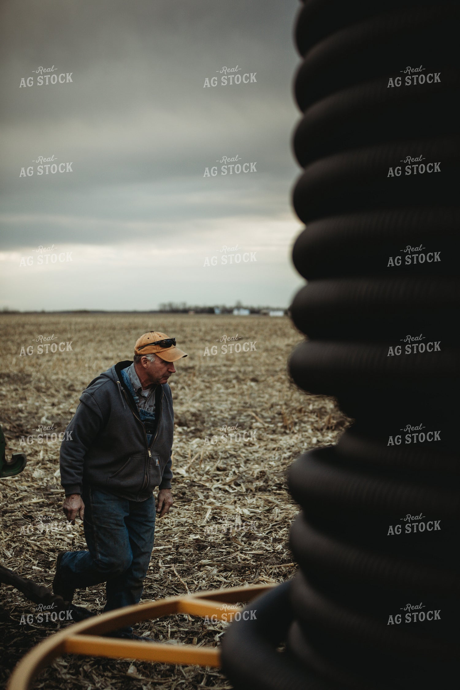 Farmer with Spool of Tile 3681