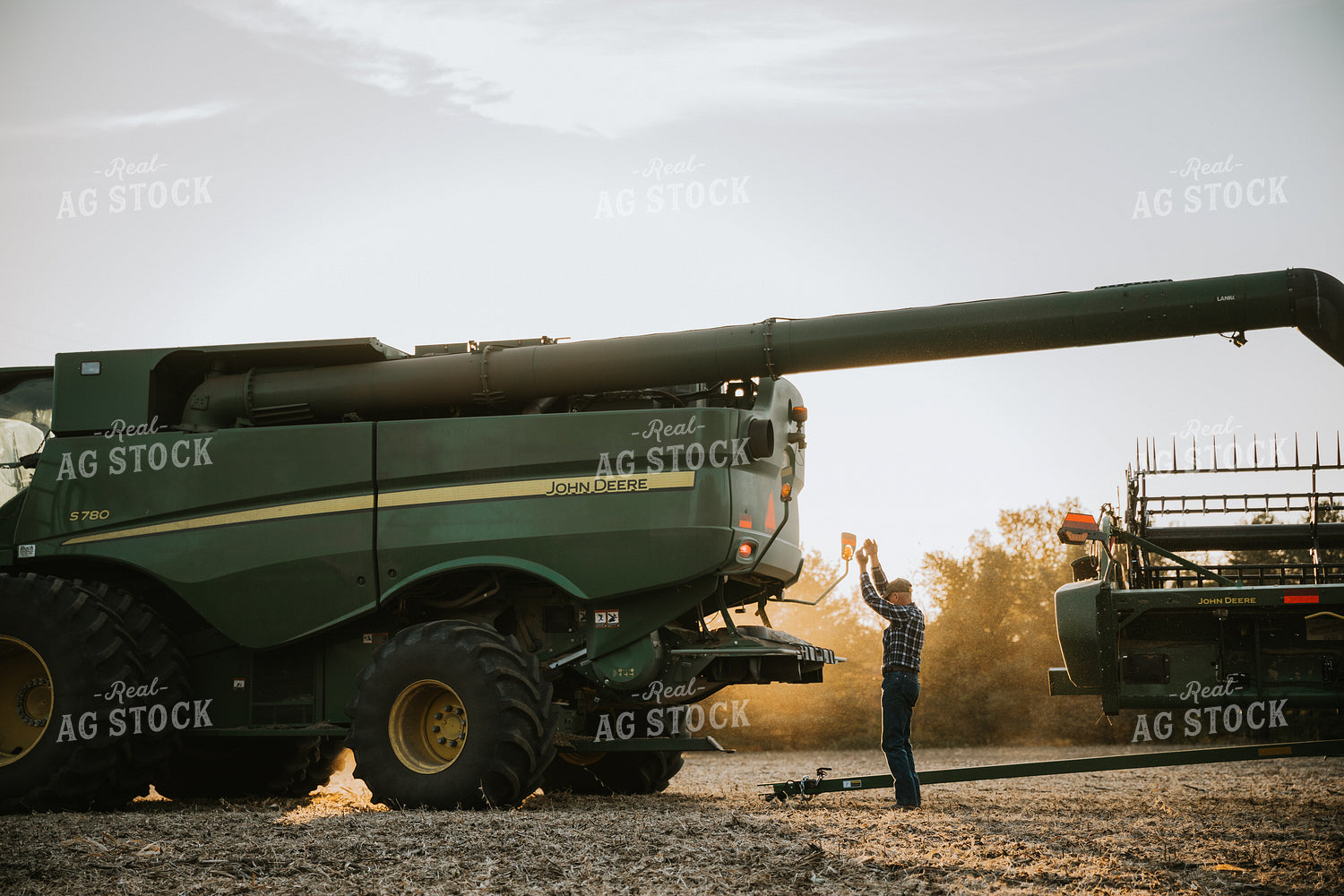 Farmer with Combine and Head 6743