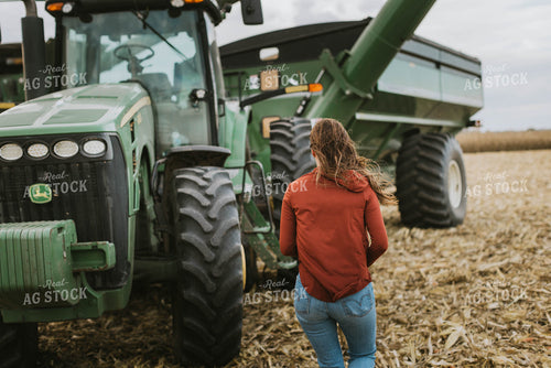 Female Farmer Walking to Tractor 8541