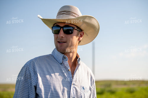 Rancher Walking in Pasture 212113