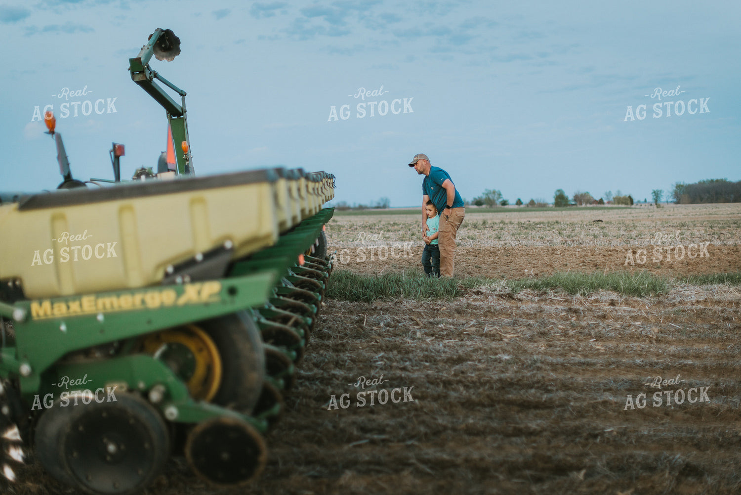 Farmer in Field with Farm Boy 7472