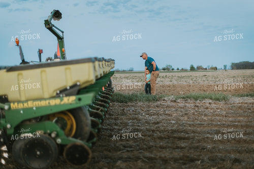 Farmer in Field with Farm Boy 7472