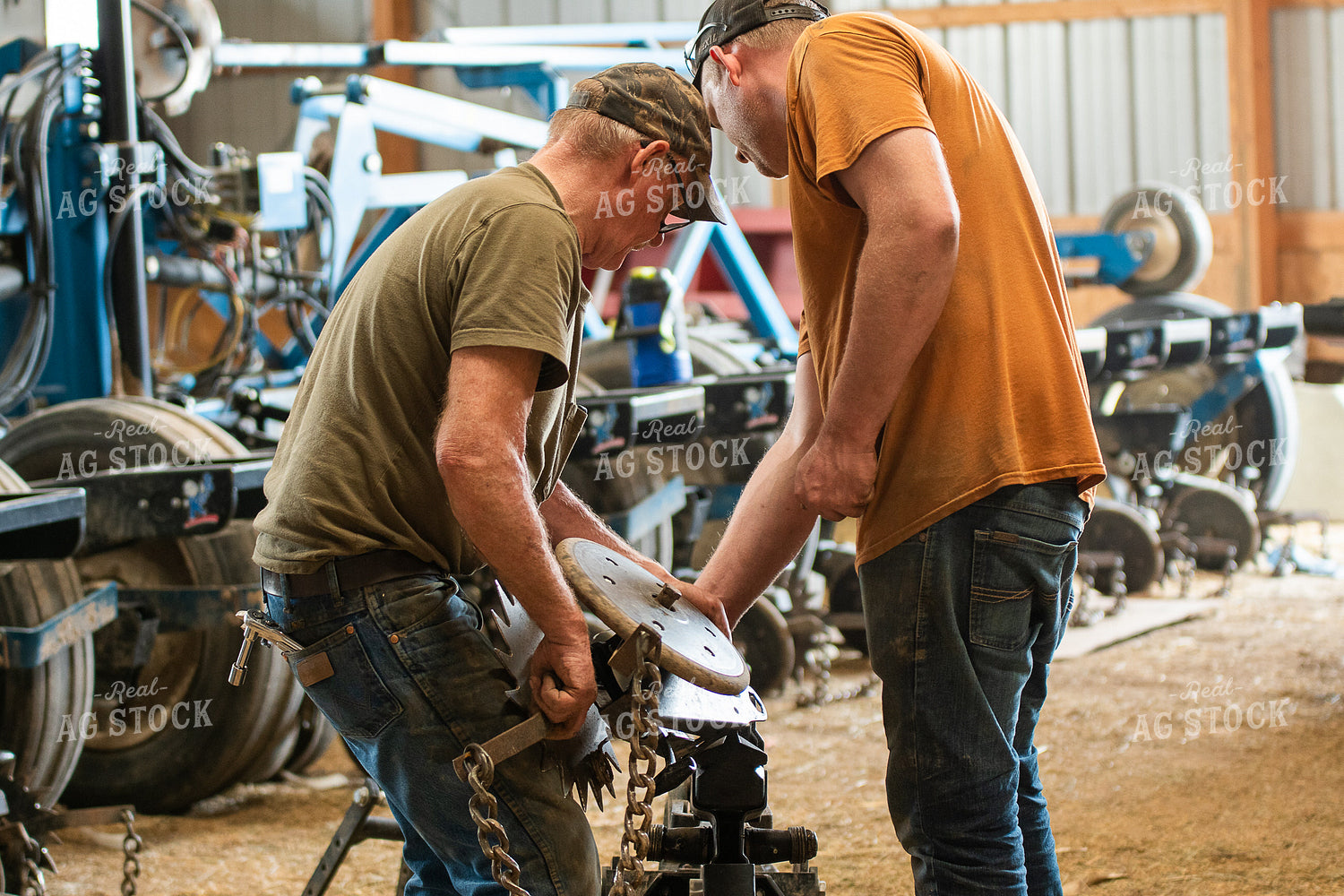 Farmers Working in Shed 50268